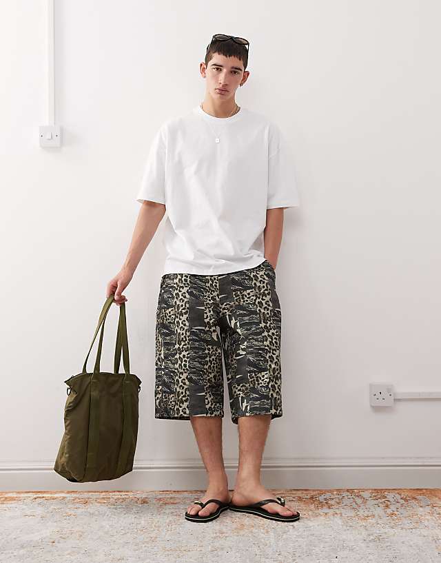asos Reclaimed Vintage oversized longline denim jort in camo animal print