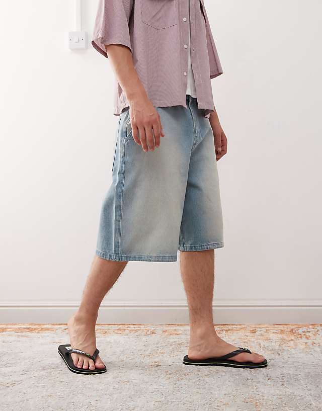 Asos Reclaimed Vintage Oversized Longline Denim Jort In Light Blue Faded Wash