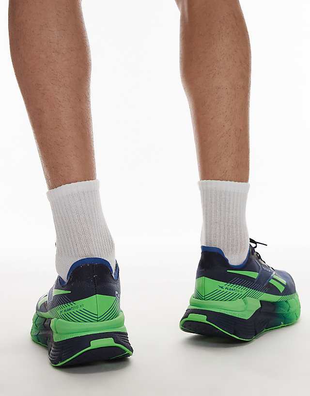 Asos Reebok Zignition Running Trainers In Navy And Green