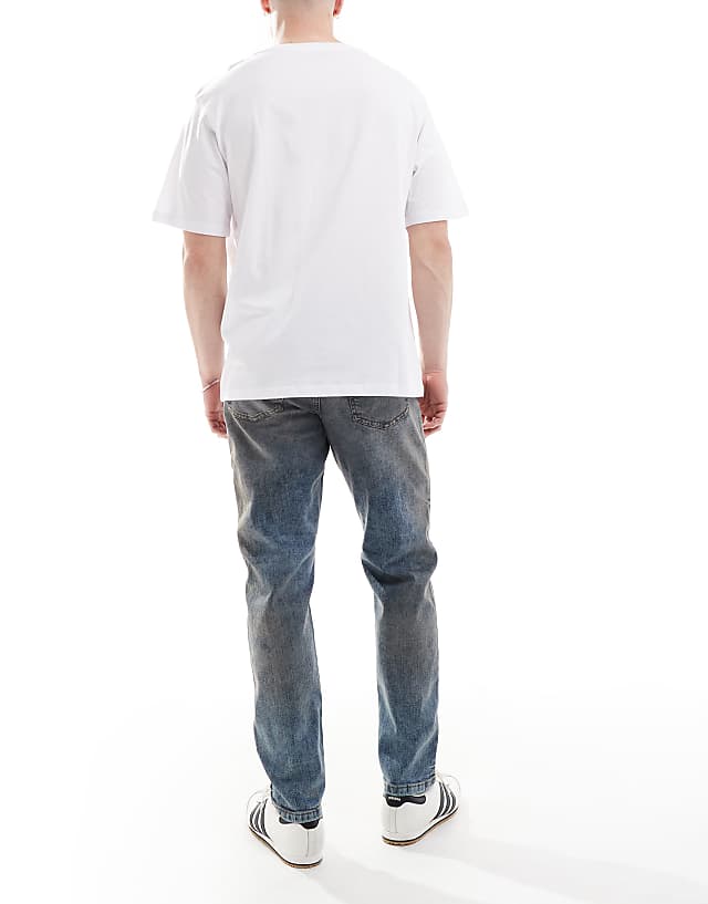 Asos River Island Tapered Fit Jeans In Midwash Blue