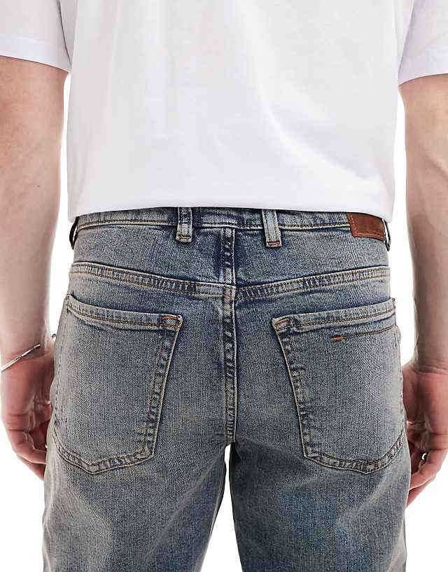 Asos River Island Tapered Fit Jeans In Midwash Blue