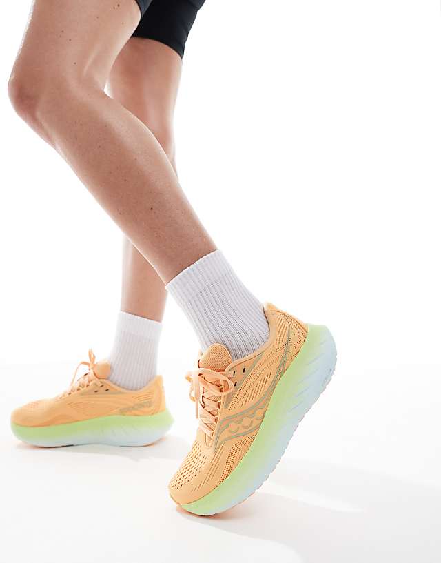 asos Saucony Ride 18 neutral cushioning trainers in peach and sunny