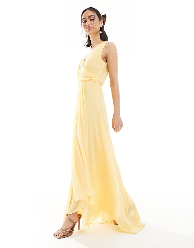asos TFNC Bridesmaid chiffon wrap front maxi dress with wrap skirt in lemon