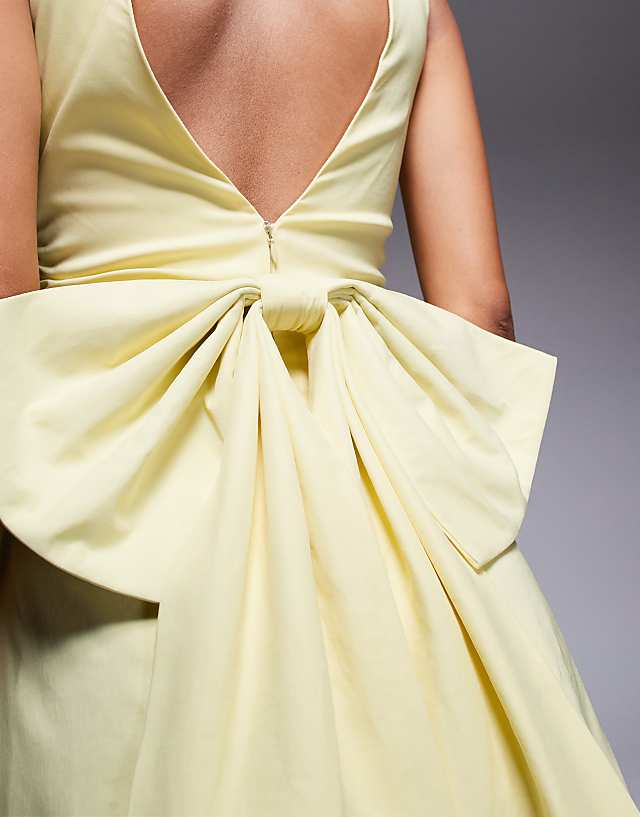 Asos TFNC Structured Mini Dress In Bengaline With Bow Back Detail In Lemon