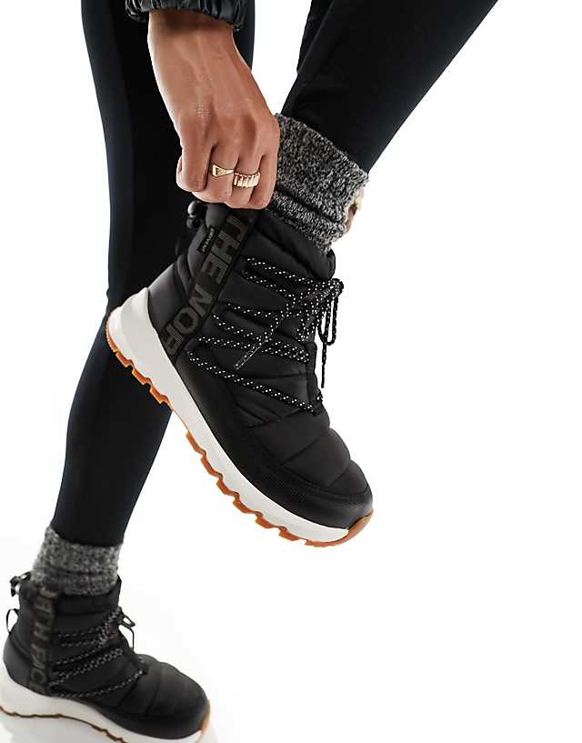 asos The North Face Thermoball insulated lace up boots in black and white