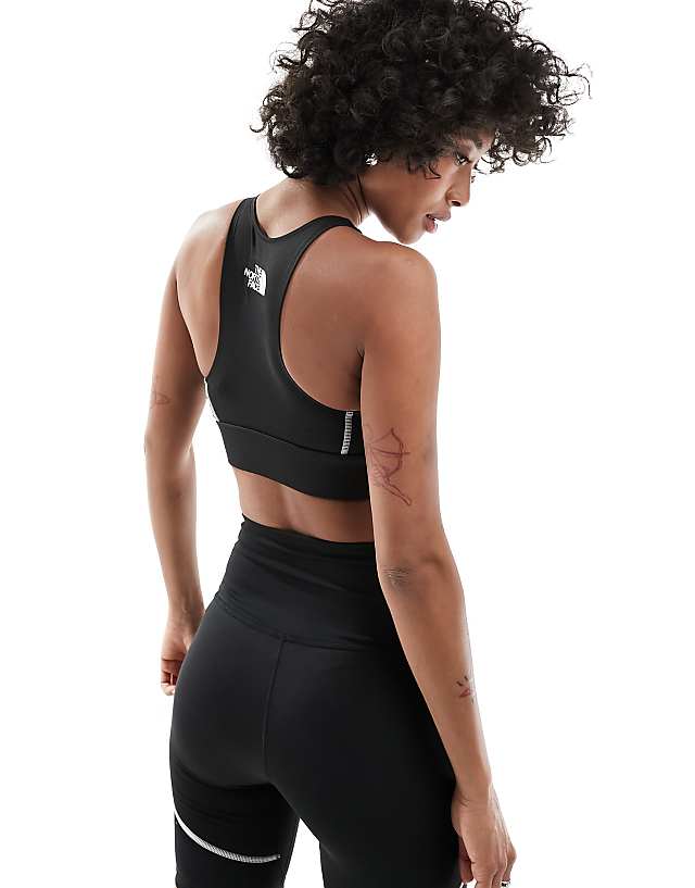 Asos The North Face Training Hakuun Contour Seam Mid Support Sports Bra In Black