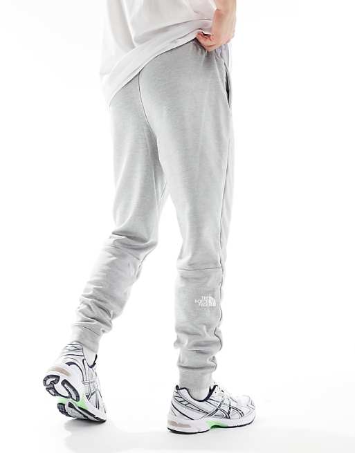 Asos The North Face Training Reaxion Fleece Joggers In Grey