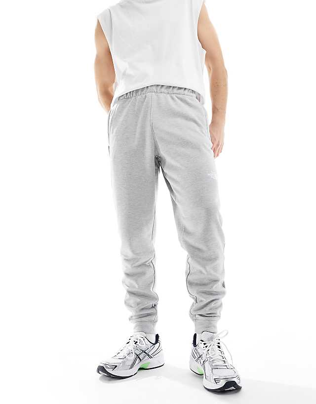 asos The North Face Training Reaxion fleece joggers in grey
