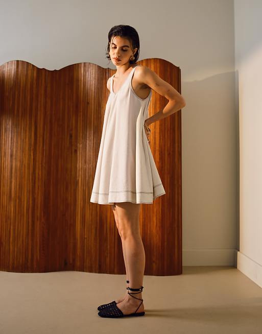 asos Topshop linen trapeze mini dress with deep hem in natural with contrast stitch