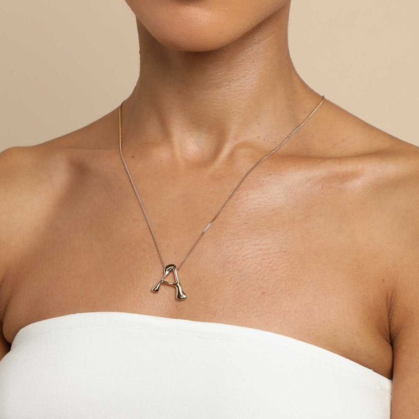 Astrid & Miyu A Initial Bold Pendant Necklace In Gold