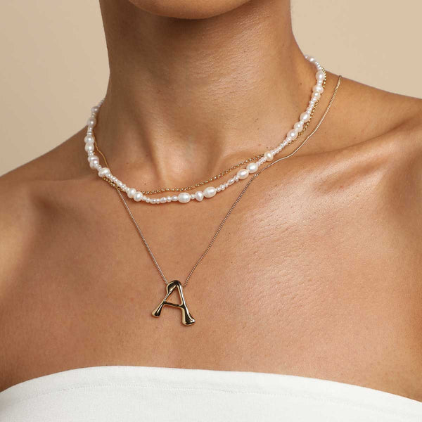Astrid & Miyu A Initial Bold Pendant Necklace In Gold