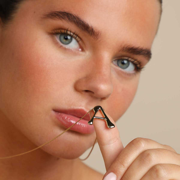 Astrid & Miyu A Initial Bold Pendant Necklace In Gold