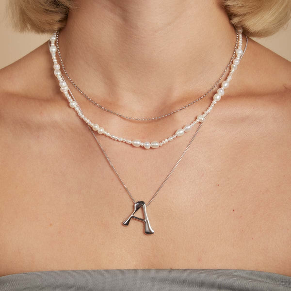 Astrid & Miyu A Initial Bold Pendant Necklace In Silver
