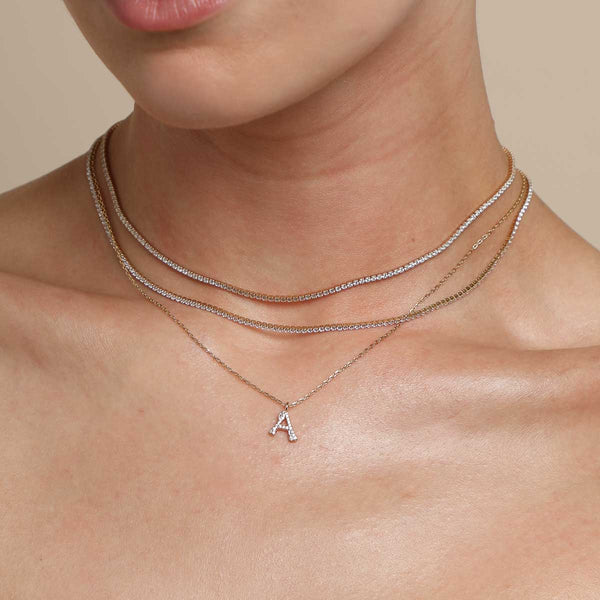 Astrid & Miyu A Initial Pavé Pendant Necklace In Gold