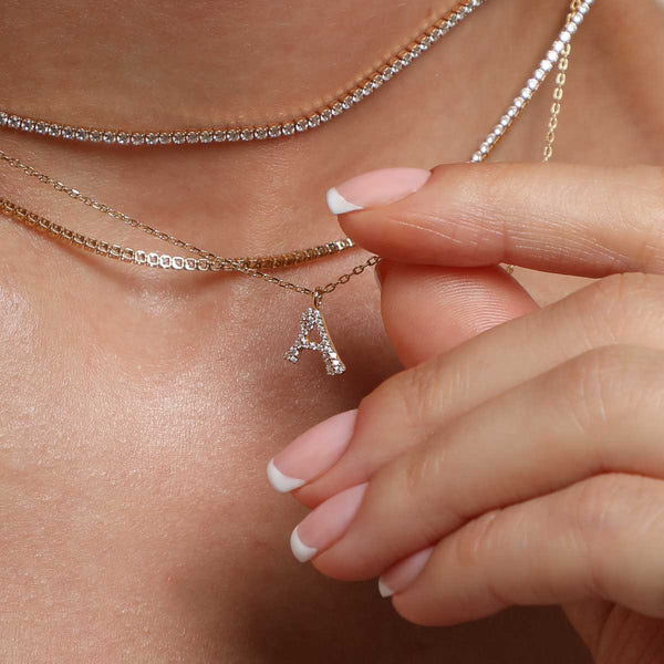 Astrid & Miyu A Initial Pavé Pendant Necklace In Gold
