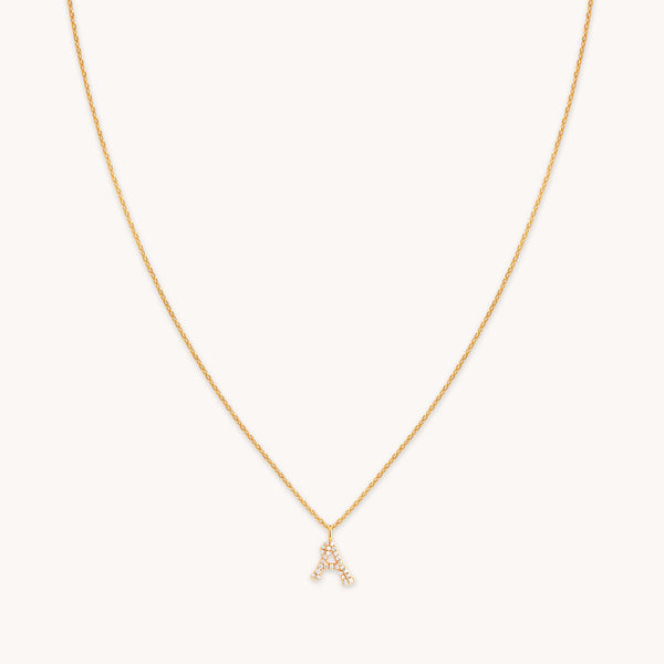 astrid & miyu A Initial Pavé Pendant Necklace in Gold