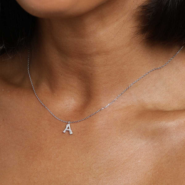 Astrid & Miyu A Initial Pavé Pendant Necklace In Silver