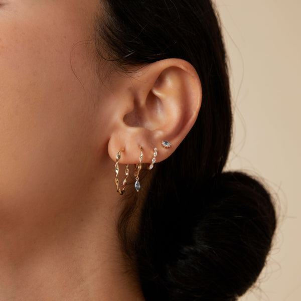 Astrid & Miyu Alexandrite Charm Twist Huggies In Solid Gold