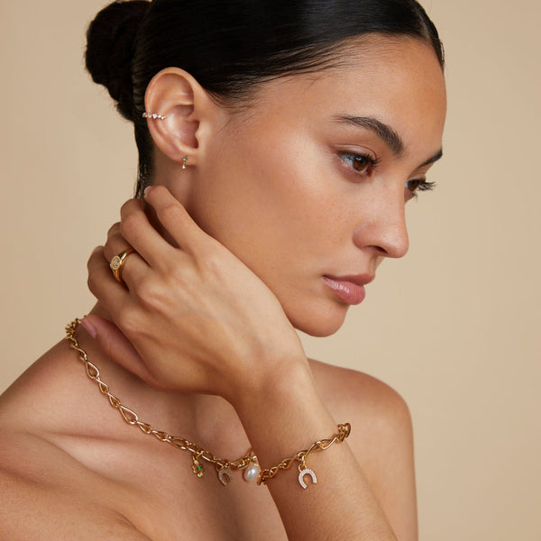 Astrid & Miyu Blue Topaz Star Charm Studs In Gold