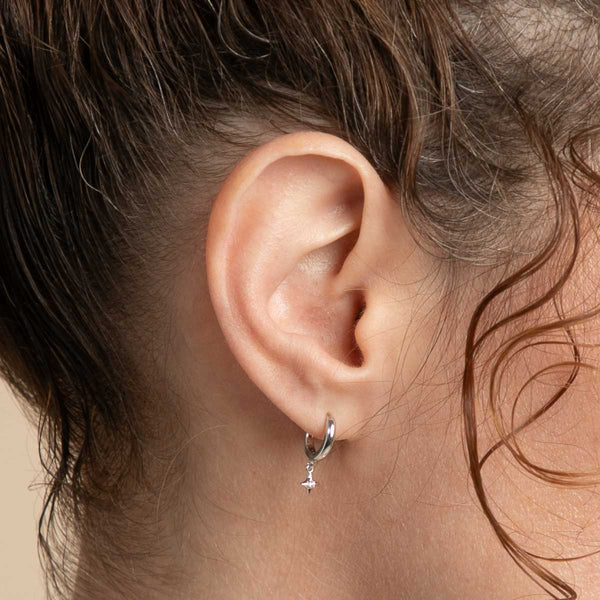 Astrid & Miyu Cosmic Star Charm Huggies In Silver