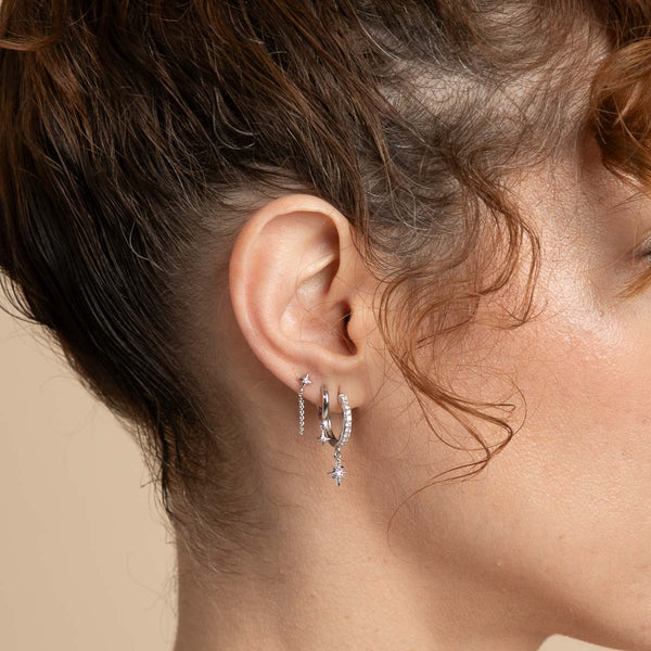 Astrid & Miyu Cosmic Star Charm Huggies In Silver