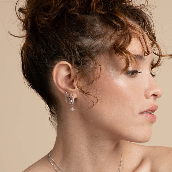 Astrid & Miyu Cosmic Star Charm Huggies In Silver