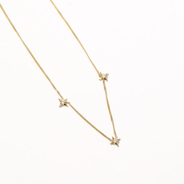 Astrid & Miyu Cosmic Star Charm Necklace In Gold