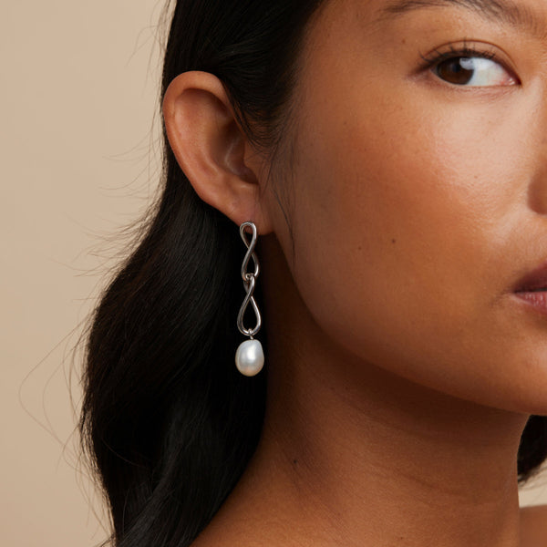 Astrid & Miyu Infinite Pearl Drop Studs In Silver