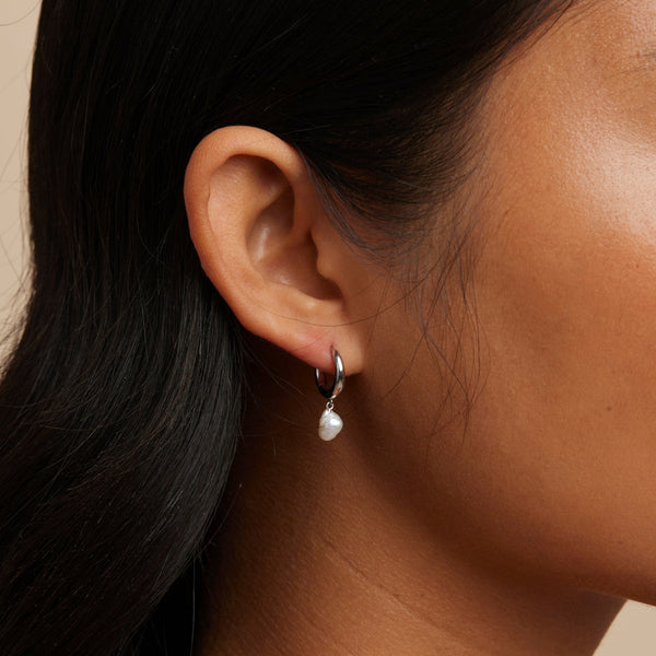 Astrid & Miyu Pearl Charm Huggies In Silver