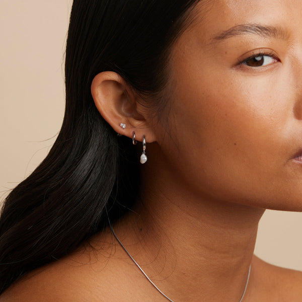 Astrid & Miyu Pearl Charm Huggies In Silver