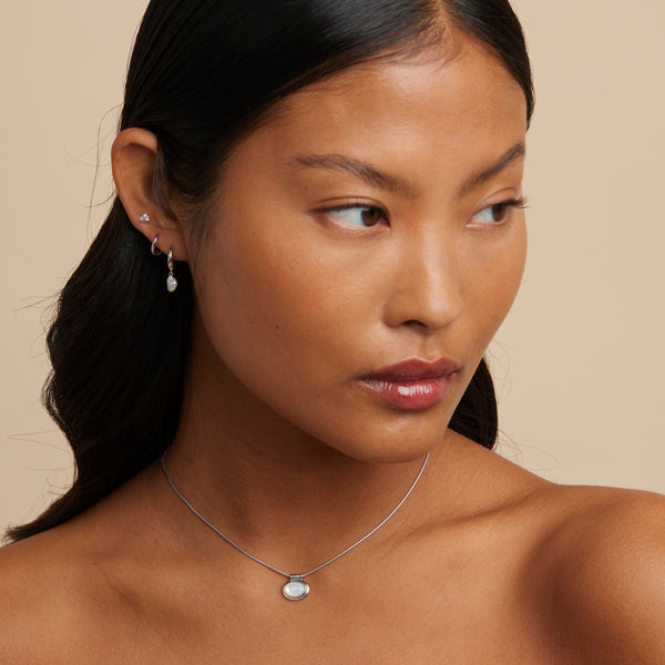 Astrid & Miyu Pearl Charm Huggies In Silver