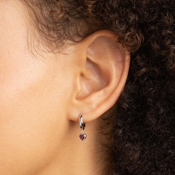 Astrid & Miyu Red Heart Charm Huggies In Silver