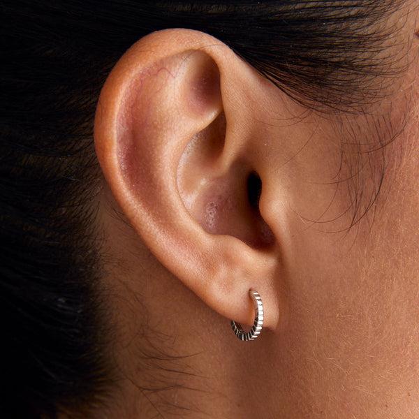 Astrid & Miyu Ridged Huggies In Solid White Gold