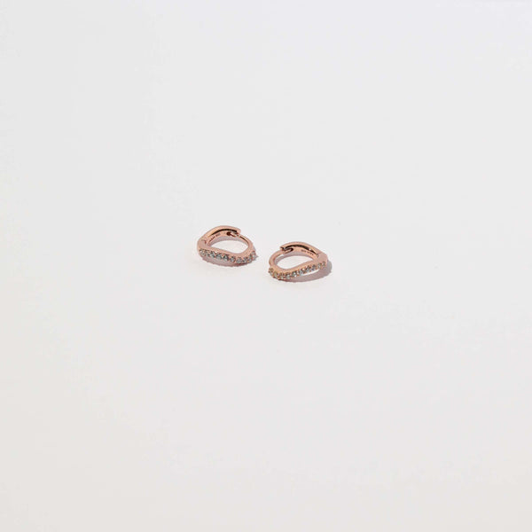 Astrid & Miyu Wave Crystal Huggies In Rose Gold
