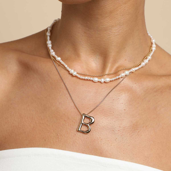 Astrid & Miyu B Initial Bold Pendant Necklace In Gold