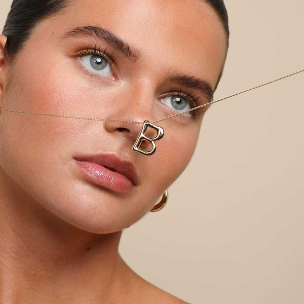 Astrid & Miyu B Initial Bold Pendant Necklace In Gold