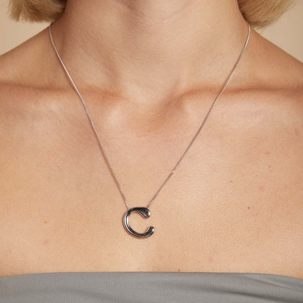Astrid & Miyu C Initial Bold Pendant Necklace In Silver