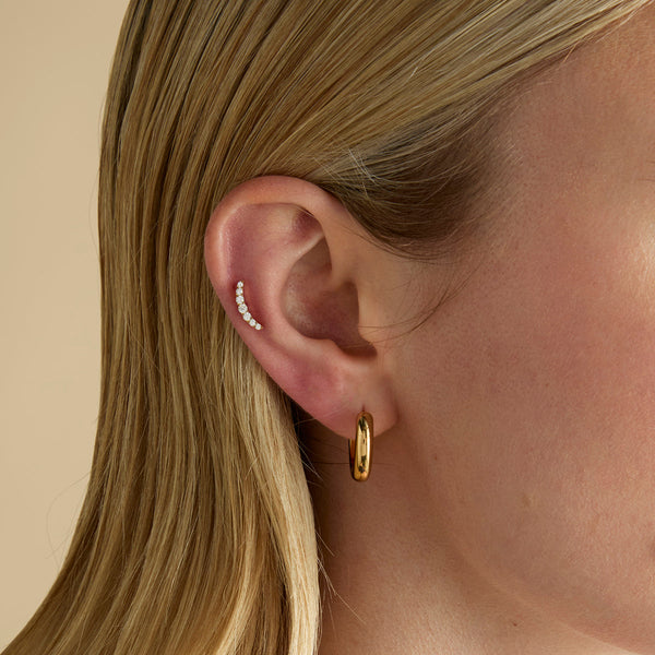 Astrid & Miyu Curved Crystal Titanium Piercing Stud In Gold