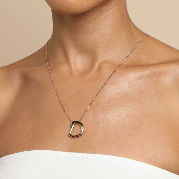 Astrid & Miyu D Initial Bold Pendant Necklace In Gold