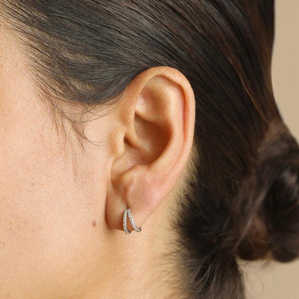 Astrid & Miyu Diamond Pavé Illusion Huggies In Solid White Gold