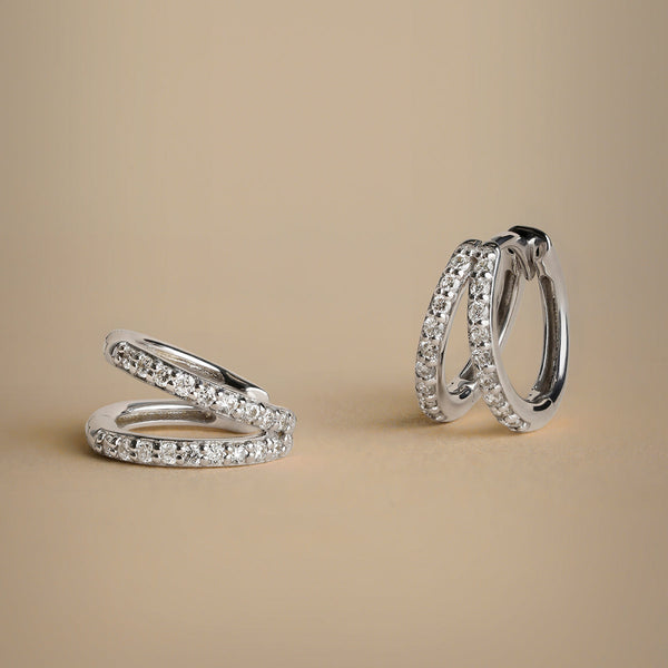 Astrid & Miyu Diamond Pavé Illusion Huggies In Solid White Gold