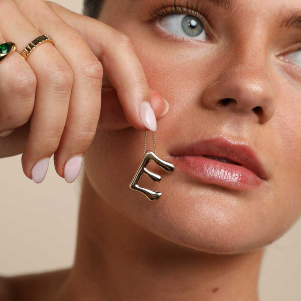 Astrid & Miyu E Initial Bold Pendant Necklace In Gold