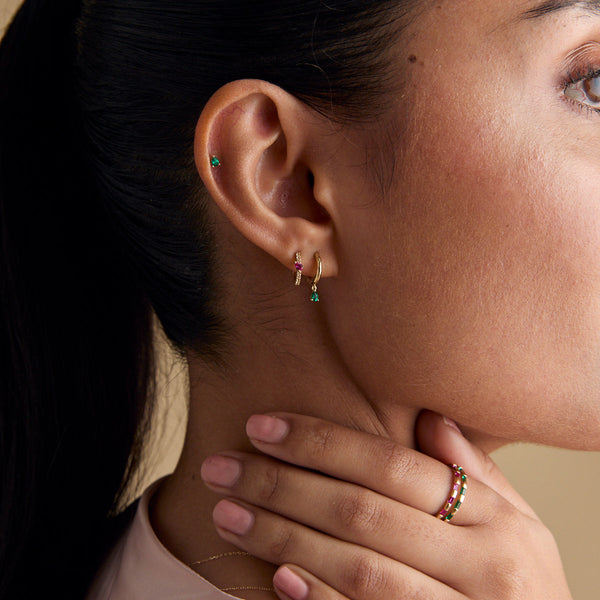 Astrid & Miyu Emerald Pear Charm Huggies In Solid Gold