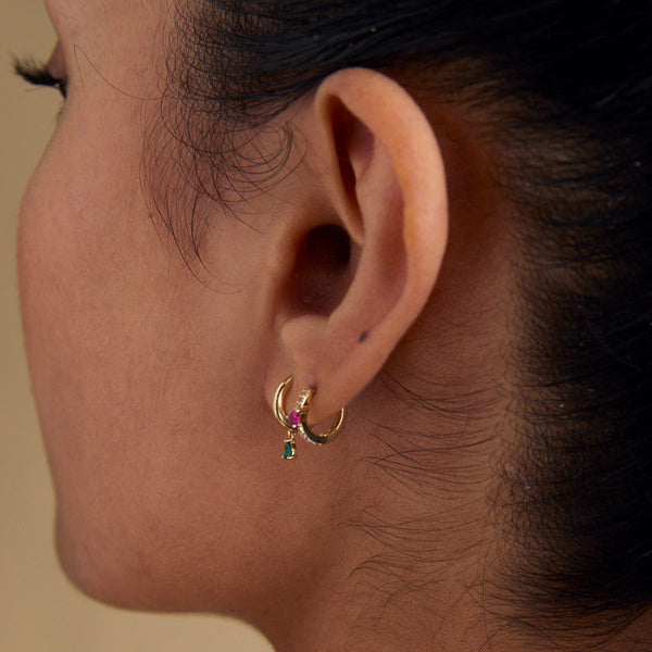 Astrid & Miyu Emerald Pear Charm Huggies In Solid Gold