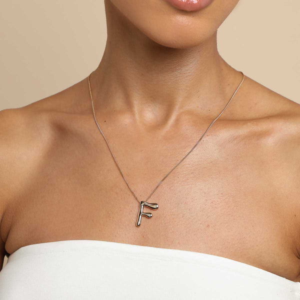 Astrid & Miyu F Initial Bold Pendant Necklace In Gold