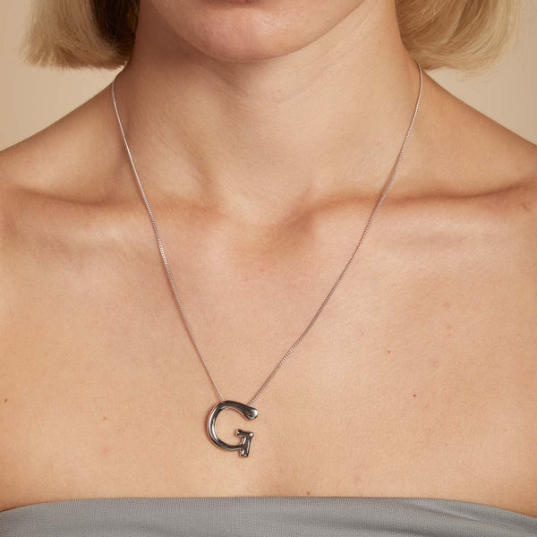 Astrid & Miyu G Initial Bold Pendant Necklace In Silver