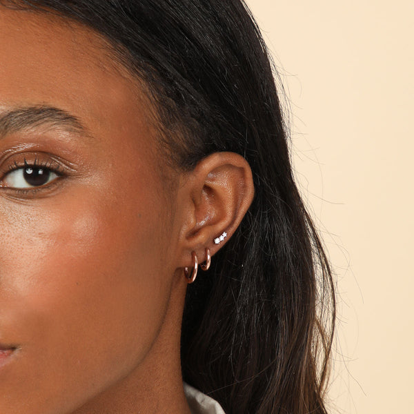 Astrid & Miyu Glimmer Crystal Climber Stud Earrings In Rose Gold