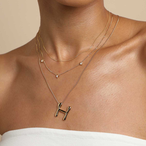 Astrid & Miyu H Initial Bold Pendant Necklace In Gold