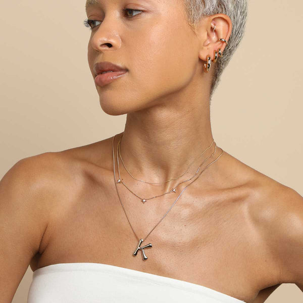 Astrid & Miyu K Initial Bold Pendant Necklace In Gold