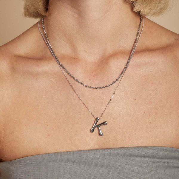Astrid & Miyu K Initial Bold Pendant Necklace In Silver